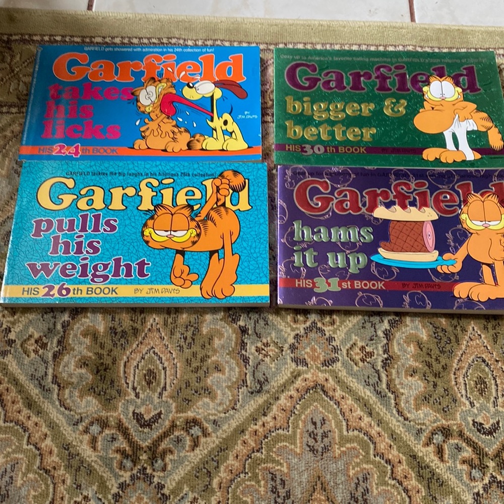 Vintage 1990s, a lot of four Garfield books